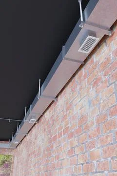 Ventilation in a brick room with a black ceiling. 3d Stock Illustration