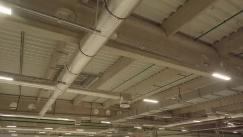 Ventilation ducts inside a large warehouse Stock Footage 249963228