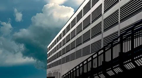 Ventilation facade on cloudy day. Modern architectural wall with metal slats, Foto stock