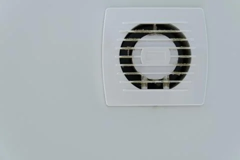 Ventilation grill on the white ceiling. there is dirt in the form of dust on the Stock Photos