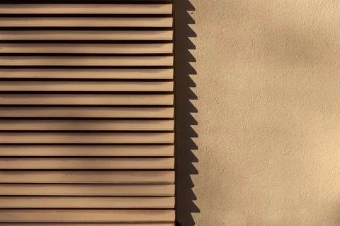 Ventilation grille on plaster wall architectural background Stock Photos