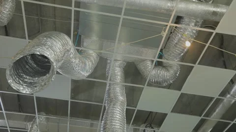 Ventilation in an industrial building. Installation of ventilation ducts 動画素材 289625848