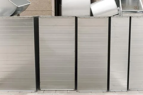 Ventilation rectangular ducts and pipeline parts on store outdoors. Stock Photos