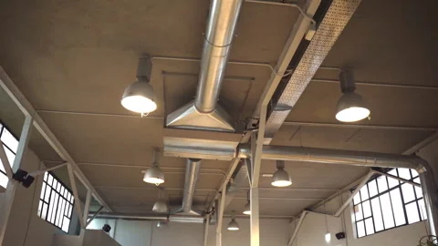 Ventilation system and artificial lamps in loft design building, metallic Stock-Footage 250484316