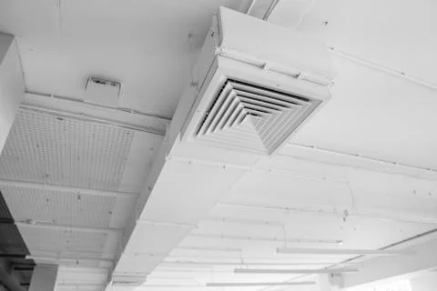 Ventilation system on the ceiling of large buildings. Ventilation pipes in Stock Photos