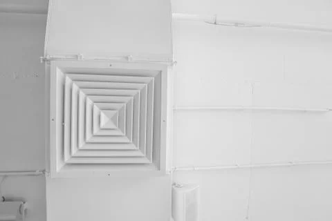 Ventilation system on the ceiling of large buildings. Ventilation pipes in Stock Photos