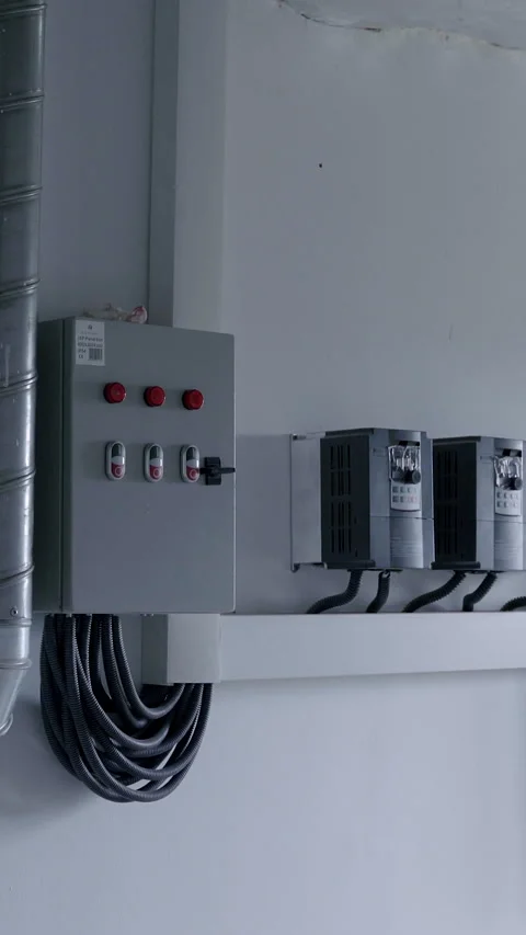 Ventilation system featuring metallic ducts and control panel mounted on a clean Stock Footage 313925786
