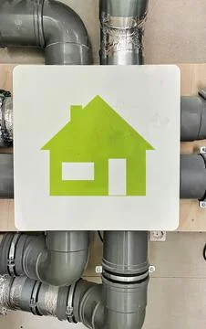 Ventilation system with house icon for smart home comfort and energy efficien Stock Photos