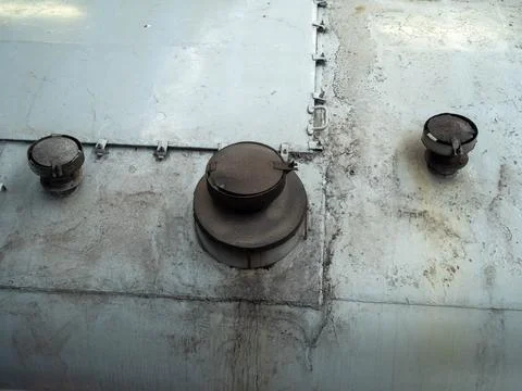 Ventilation system or stove heating pipe on roof of railway car Stock Photos