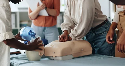 Ventilator, cpr and hands of people with dummy for demonstration, tutorial and Stock Footage 306514851