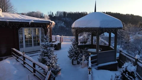 The veranda of the house was covered with snow. Frosty sunny morning Stock Footage 236013273