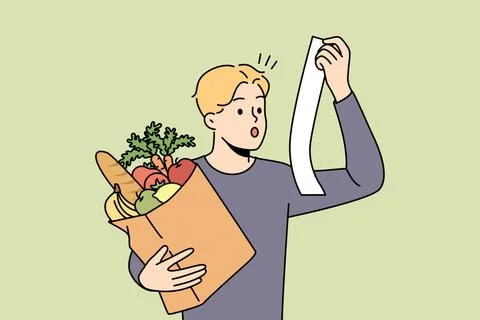 Verblüffter Mann schockiert über Preise für Lebensmittel Stunned young man Stock Photos