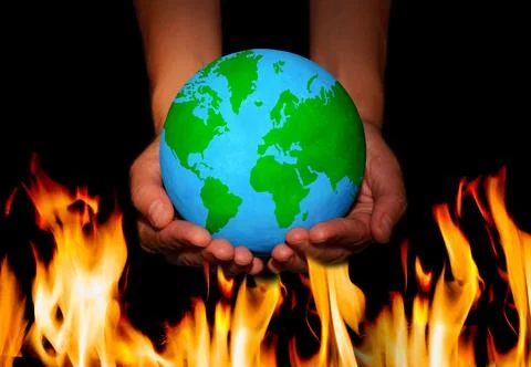 Verdant Globe in Hands over Fire Flames Stock-Fotos