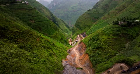 Verdant valley dancing through the loop, nature and transport in one group Stock Footage 282795405