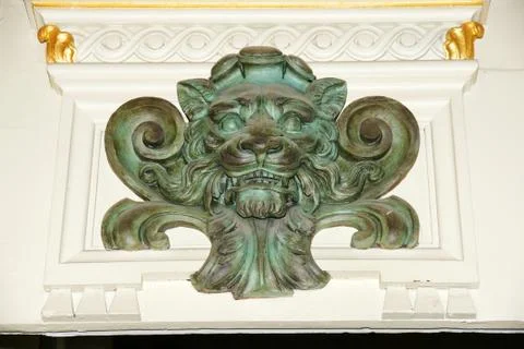 Verdigris lion Stock Photos