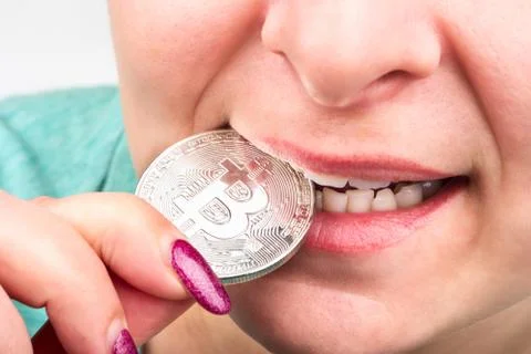 Verification of bitcoin on tooth Stock Photos