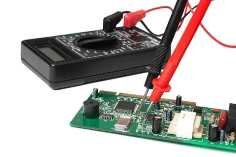 Verification testing of electronic boards digital multimeter Stock Photos