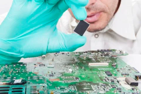Verifying microchip Stock Photos