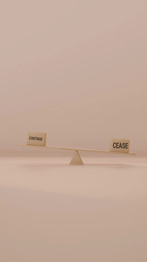 VERITCAL VIDEO OF CONTINUE AND CEASE BALANCING ON SEESAW Stock Footage 299189832