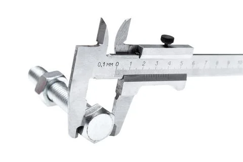 A vernier caliper measures the size of a threaded bolt head. Stock Photos