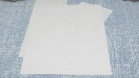 A versatile blank paper setup designed for diverse artistic projects and Vídeo Stock 283639545