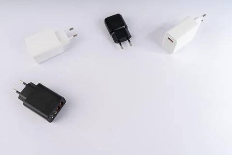 Versatile Collection of AC Power Adapters and USB Chargers for Modern Devic.. Stock Photos