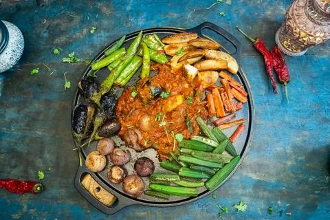 Versatile dish  Tawa masala vegetable with six type of vegetables on a pan. Stock Photos