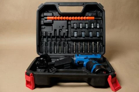 Versatile tool case showcasing a powerful cordless screwdriver and accessories Stock Photos