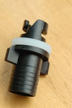 Versatile valve adapter for easy inflating of various water devices Stock Photos