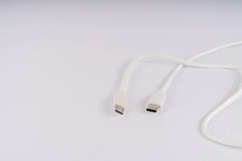 Versatile White USB Cable with Micro-USB and USB-C Connectors for Modern De.. Stock Photos