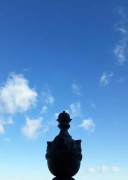A vertex of something against the backdrop of the blue sky Stock Photos