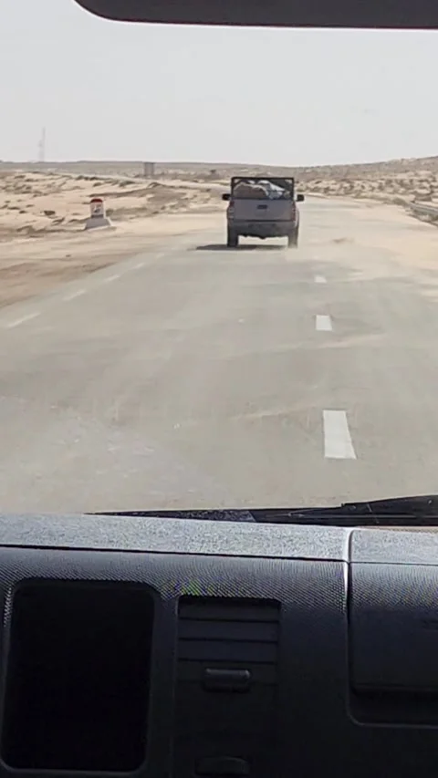 Vertical 10-Second Dynamic Driving POV on Bumpy Desert Highway Stock Footage 340029667