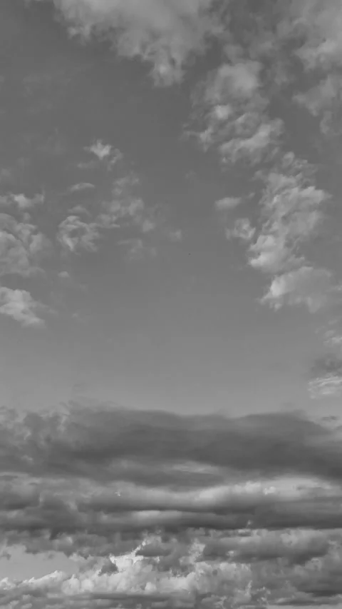 Vertical 2k aerial hyperlapse bw sequence capturing richly layered cloudy sky Stock Footage 337903932