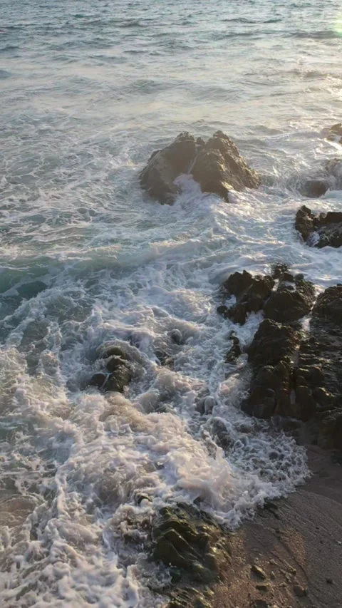 Vertical 2K slow-motion video of the shoreline Stock Footage 345867226