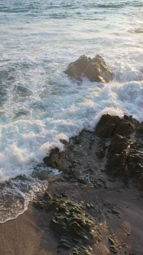 Vertical 2K video showing the foam and sand Stock Footage 345867257