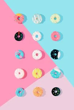 Vertical 3D render of the colorful donuts pattern on the blue and pink backgroun Illustrazione stock