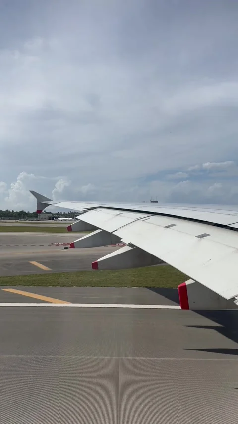 Vertical 4K Airplane Window POV Takeoff Roll And Lift Off At Miami Airport Stock Footage 335663747