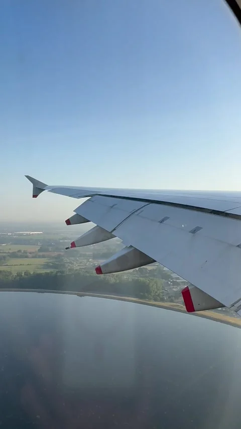 Vertical 4K Airplane Window POV One Minute Landing Touchdown At London Heathrow Stock-Footage 335663759