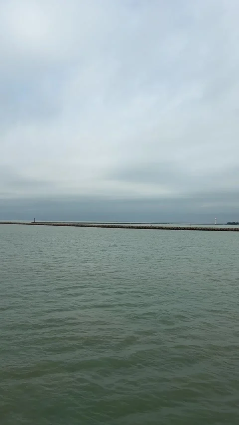 Vertical 4K Cinematic Tracking Shot of Sea Lighthouse Video stock 332037407