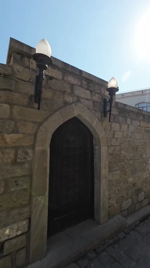 Vertical 4K Cinematic View of Historic Landmarks in Baku Old City Stock Footage 339097125