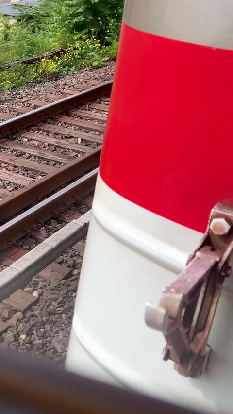 Vertical 4K city video. Red white metro train rides on rails Stock Footage 333273380