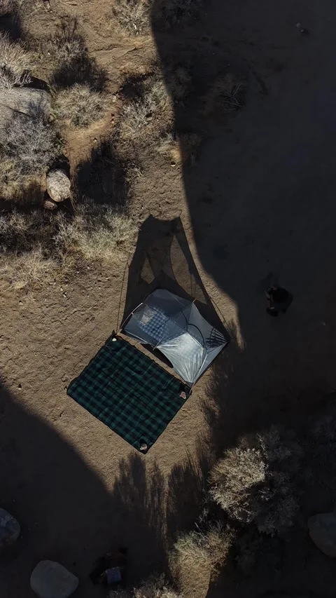 Vertical 4K Drone Descending in Circle Over Alabama Hills Campsite With Tent Stock Footage 324320485