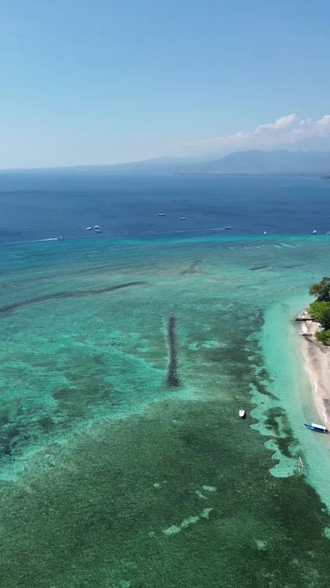 Vertical 4K Drone Gili Air Island Lombok Indonesia Tropical Beach Stock Footage 336936874