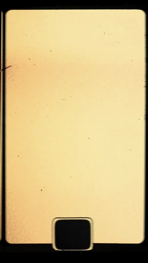 Vertical 4K film frame light leak and noise flickering background with sprocket Видео 283342276
