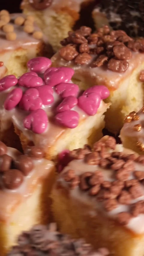 Vertical 4K High Angle Close Up of Decorated Cakes Rotating Right 스톡 동영상 333319426