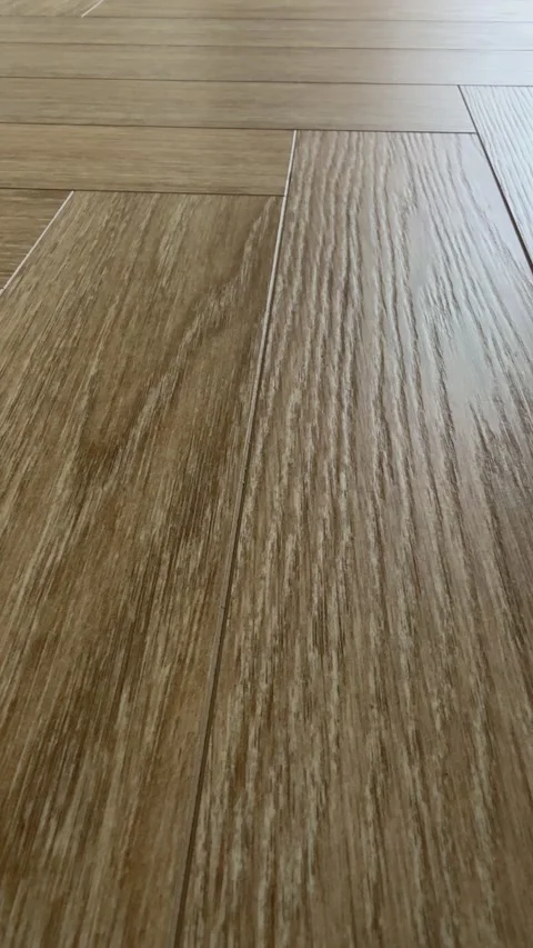 Vertical 4K - Low Angle Macro Close Up Of Oak Herringbone Floor Texture Stock Footage 345431530