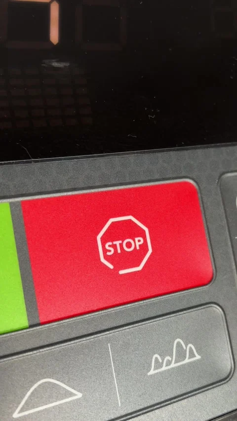Vertical 4K Macro of Finger Pressing Stop Button on Treadmill Stock Footage 329263900