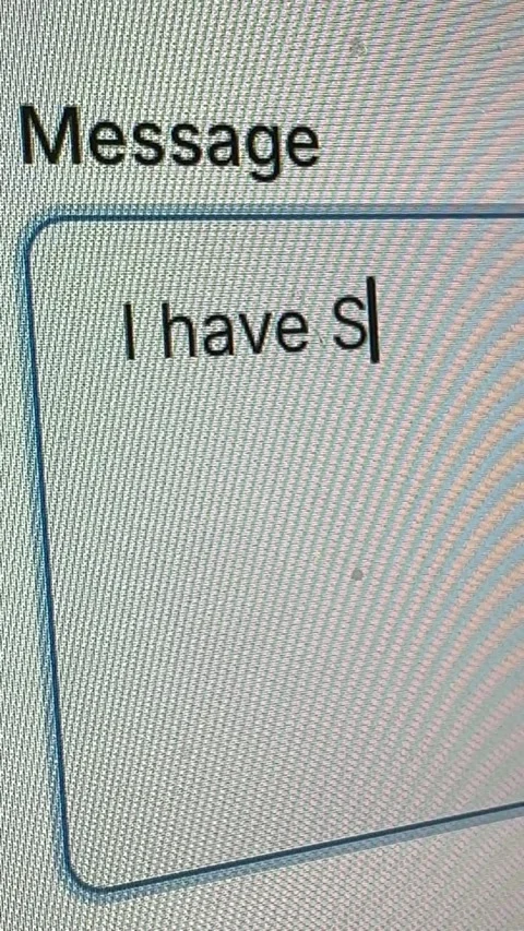 Vertical 4K macro shot of a computer screen in dark mode showing the sentence "I Stock Footage 342777883