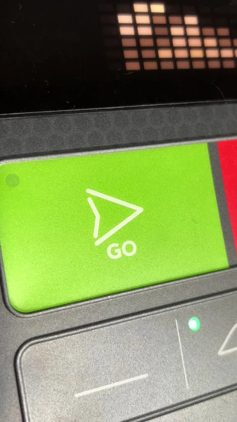 Vertical 4K Macro of Slow Steady Finger Press on Go Button on treadmill Stock Footage 329263825