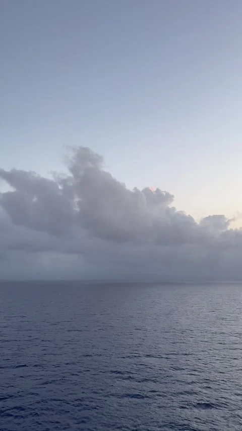 Vertical 4K Majestic Fluffy Cloud Over Calm Blue Mediterranean Sea Stock Footage 335111879